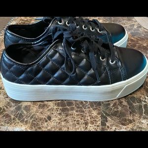 Quilted black platform sneakers